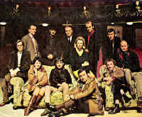 Graduates and stars of the Royal Court Theatre. Standing (left to right): David Cregan, playwright; Jack Shephard, actor; Sir Laurence Olivier; Anthony Page; John Osborne. Seated: Christopher Hampton, resident dramatist; Joan Plowright; Peter Gill, Jill Bennett, Victor Henry (Jimmy Porter in the revival of Look Back in Anger), Edward Bond. On Floor: Kenneth Haigh, the original Jimmy Porter.